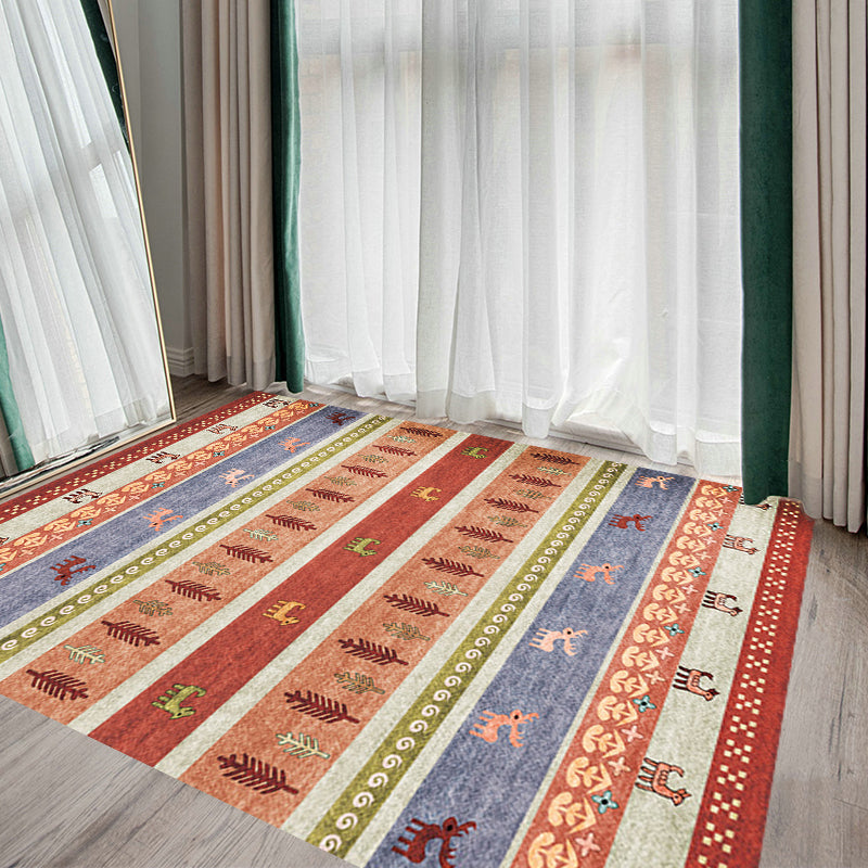 BowLift | Bohemian striped geometric rug with botanical and animal motifs synthetic non-slip backing pet-friendly area rug