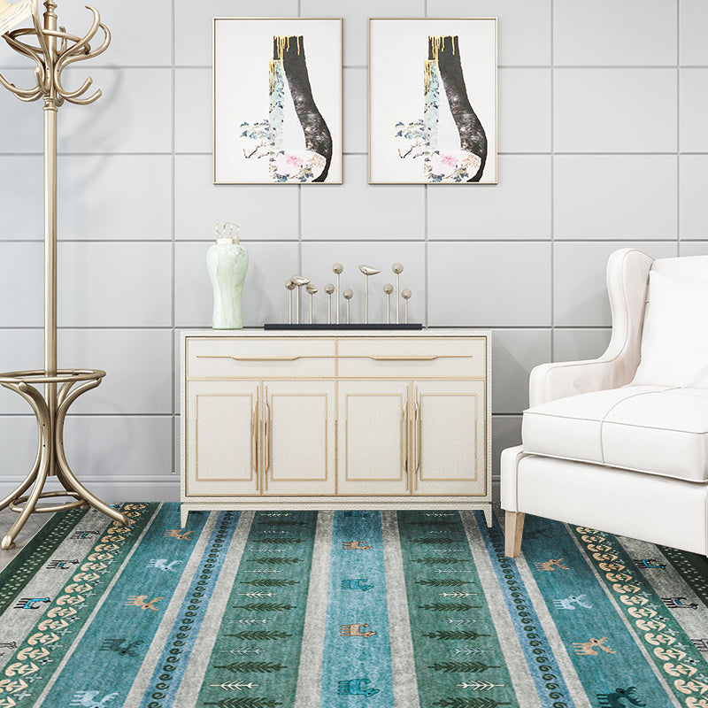 BowLift | Bohemian striped geometric rug with botanical and animal motifs synthetic non-slip backing pet-friendly area rug