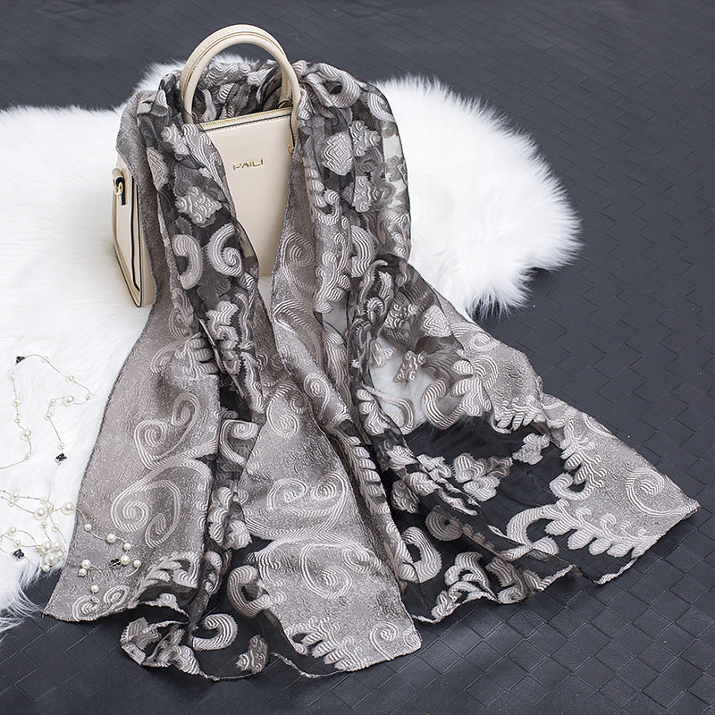 BowLift | Silk scarf with cut flowers hollow motif