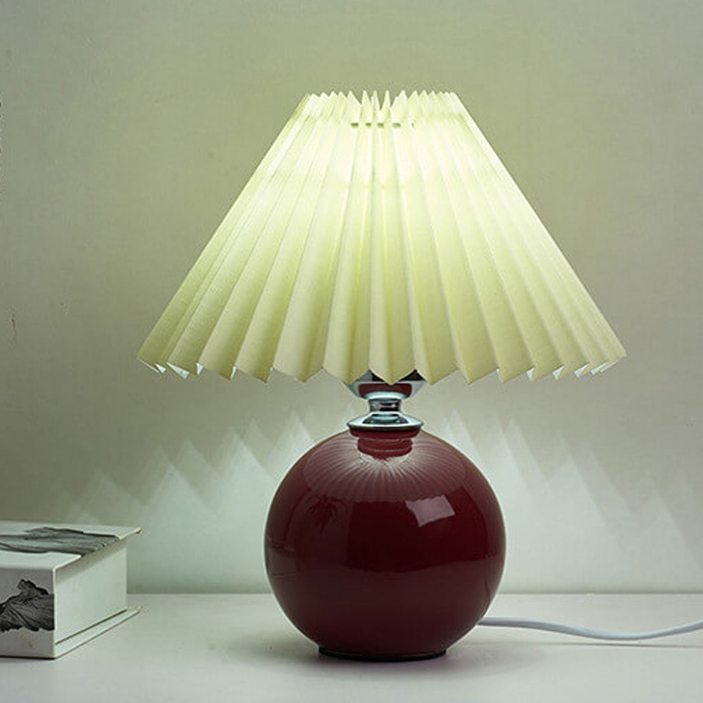 BowLift | Nordic minimalist 1-light table lamp made of ceramic with pleats