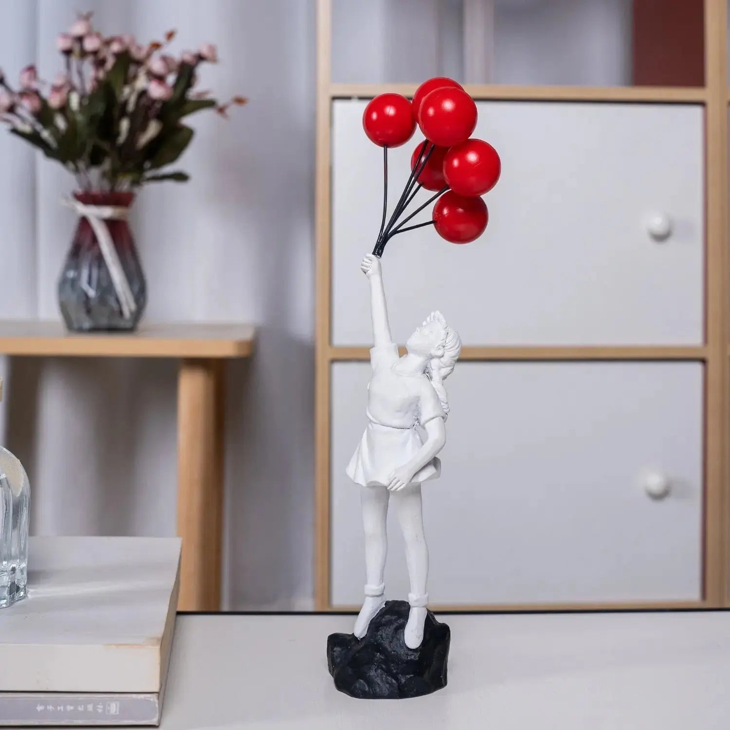 BowLift | Banksy flying Balloon Girl Statue