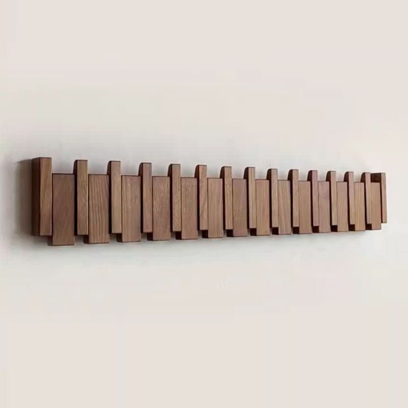 BowLift | Handcrafted piano-style wall coat rack made from walnut & beech
