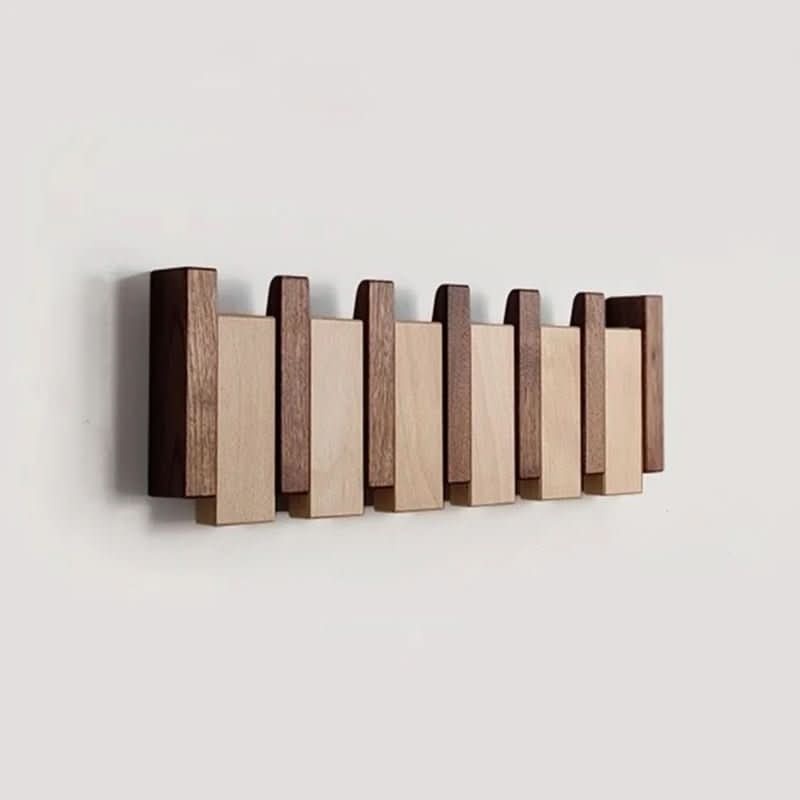 BowLift | Handcrafted piano-style wall coat rack made from walnut & beech