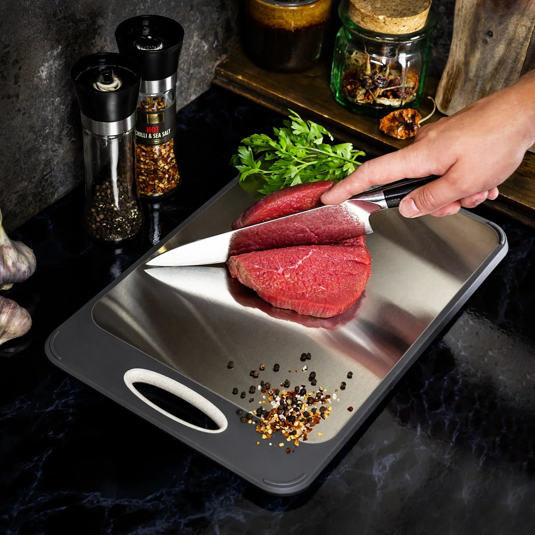 BowLift | Hygienic stainless steel cutting board with non-slip handle for precise cutting