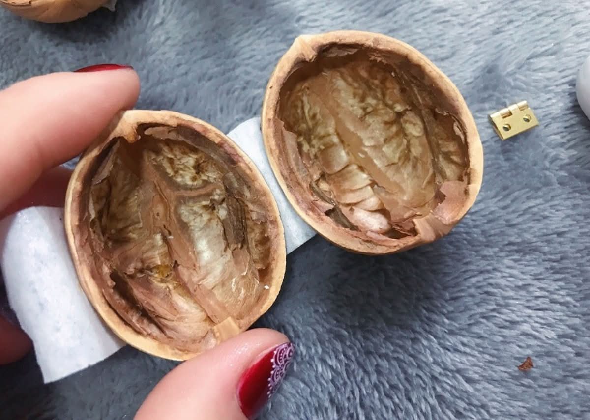 BowLift | Handmade dollhouse made from walnut shells with interior lighting