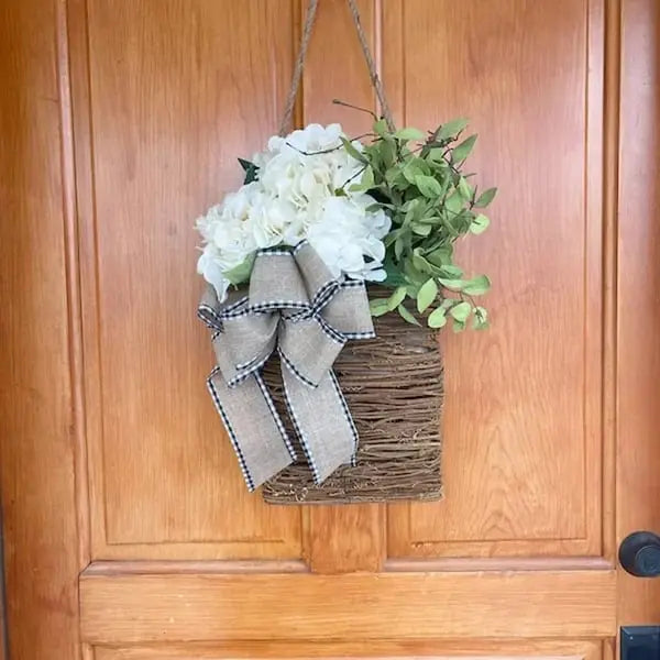 BowLift | Door hanger with cream hydrangeas – rattan basket wreath with artificial flowers