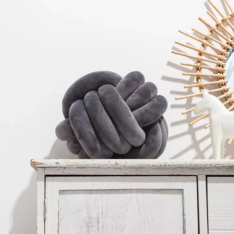BowLift | Decorative knotted suede-look ball soft cushion
