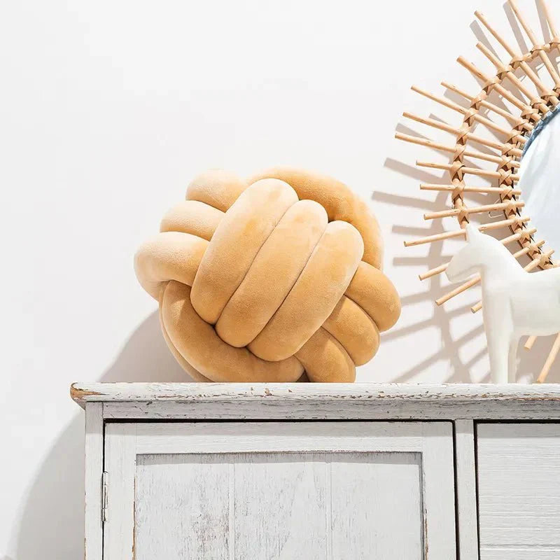 BowLift | Decorative, soft cushion with knotted ball in suede look