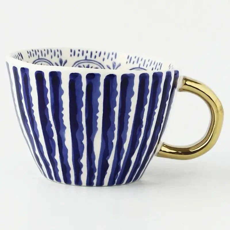 BowLift | Hand‑Painted Ceramic Mug with Gold Handle