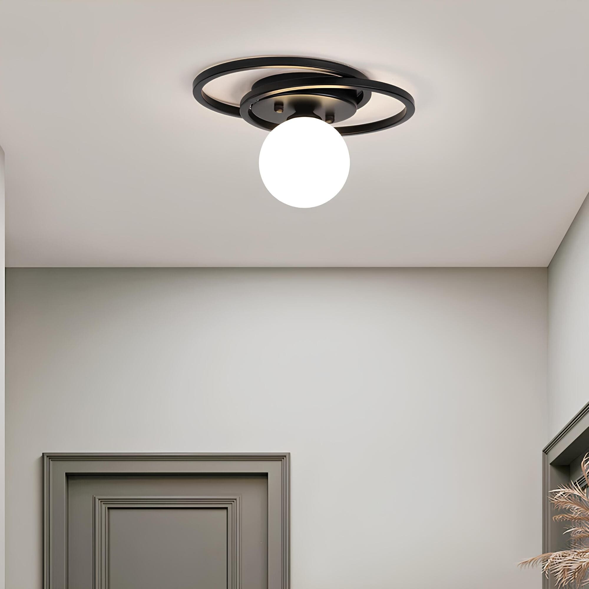 BowLift | LumiNoble | Timeless ceiling light with golden LED ball design