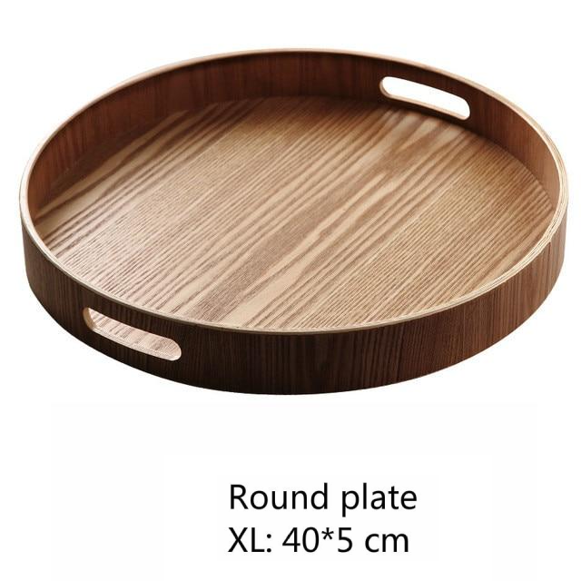 BowLift | Slim, round serving trays made of wood