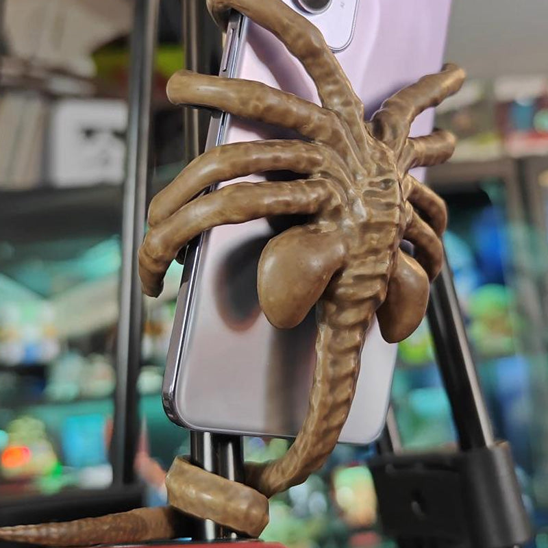 BowLift | Horrible Facehugger Phone Holder