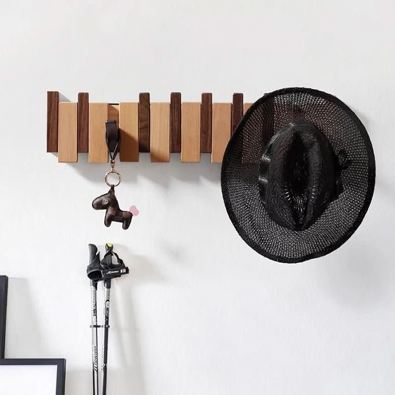 BowLift | Handcrafted piano-style wall coat rack made from walnut & beech