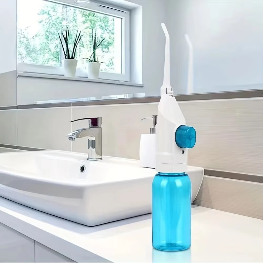 BowLift | Portable High Pressure Manual Water Flosser for Teeth Cleaning