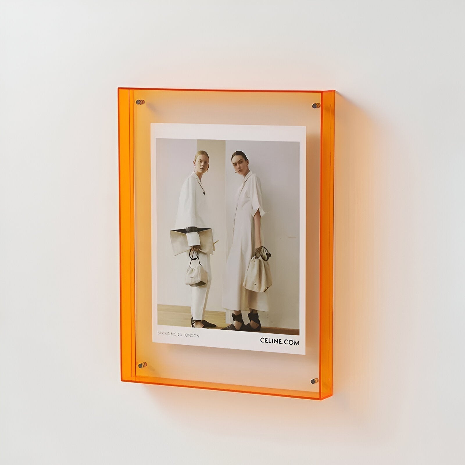 BowLift | Colored transparent acrylic frame for modern displays