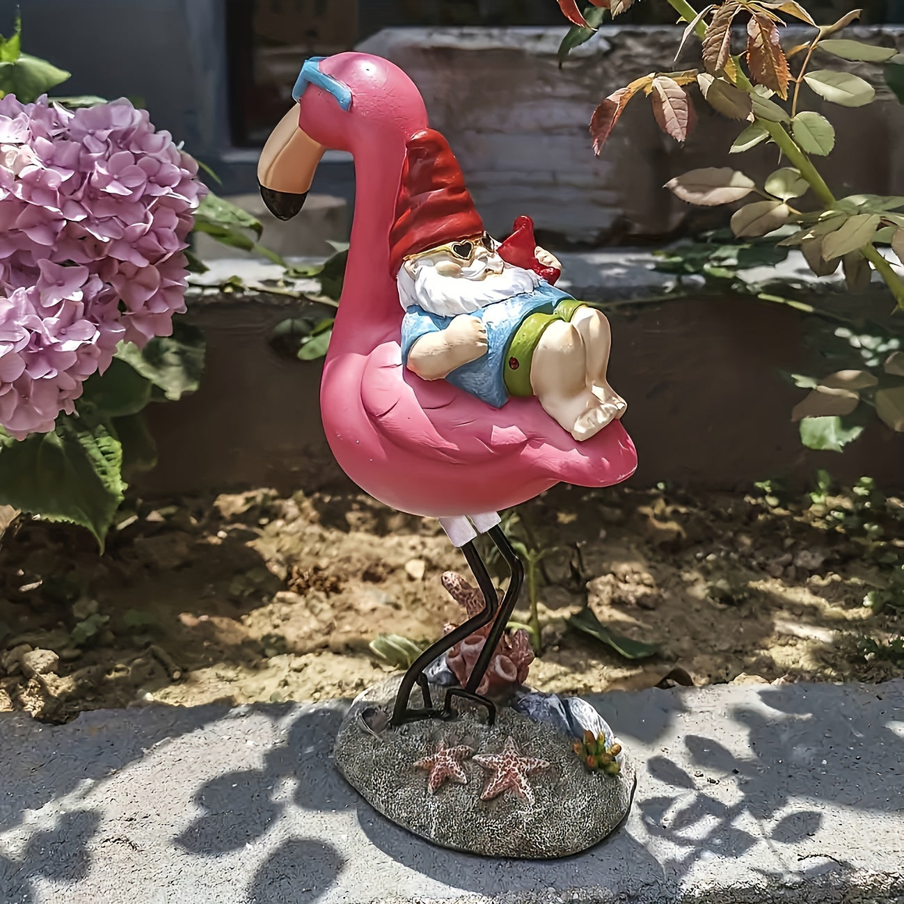 BowLift | Flamingo relaxing garden gnome statue