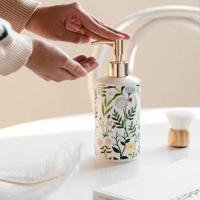 BowLift | Soap dispenser made of ceramic with floral design