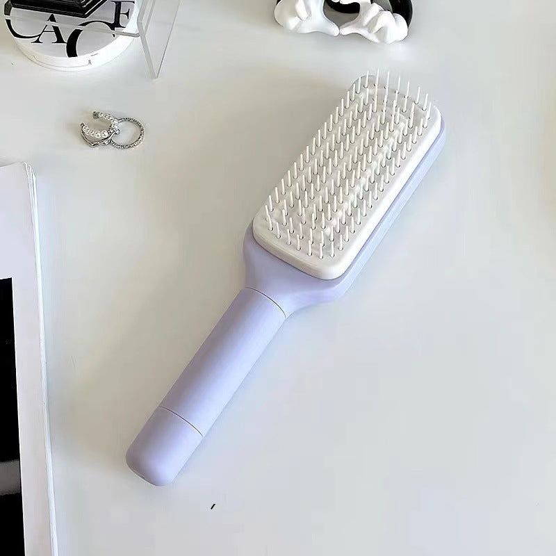 BowLift | Self-cleaning anti-static massage comb